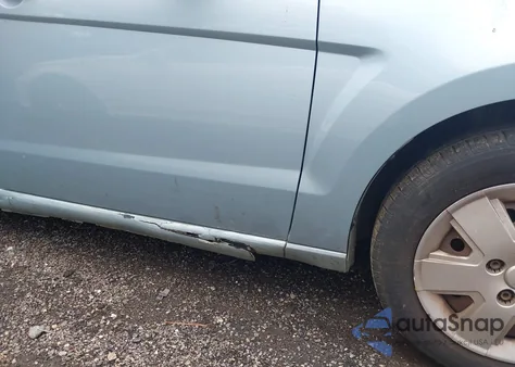 2009 Ford Focus S из США, поврежденный, VIN 1FAHP34NX9W107045